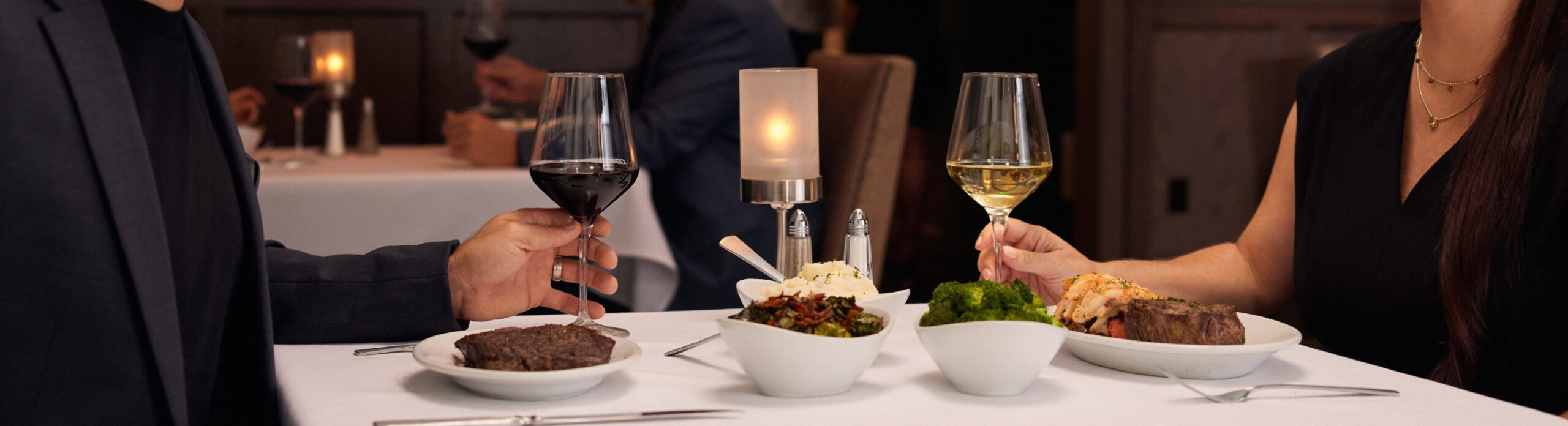 Juicy grilled steak, fresh vegetables, and fine wines served at Ruth's Chris Steak House for an upscale dining experience.
